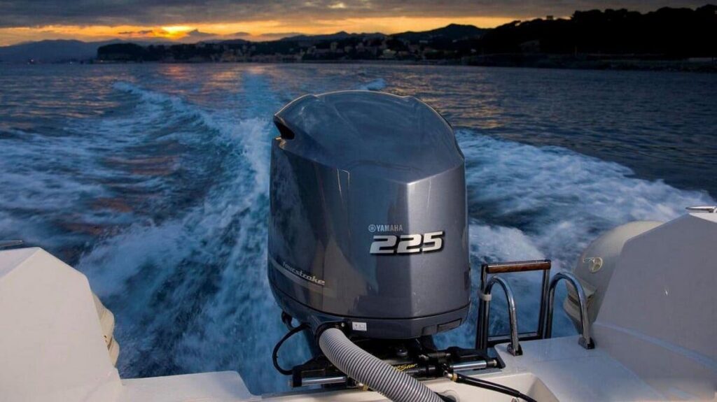 A high-performance outboard boat motor propelling a vessel across open water