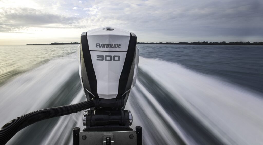 A high-performance outboard boat motor propelling a vessel across open water